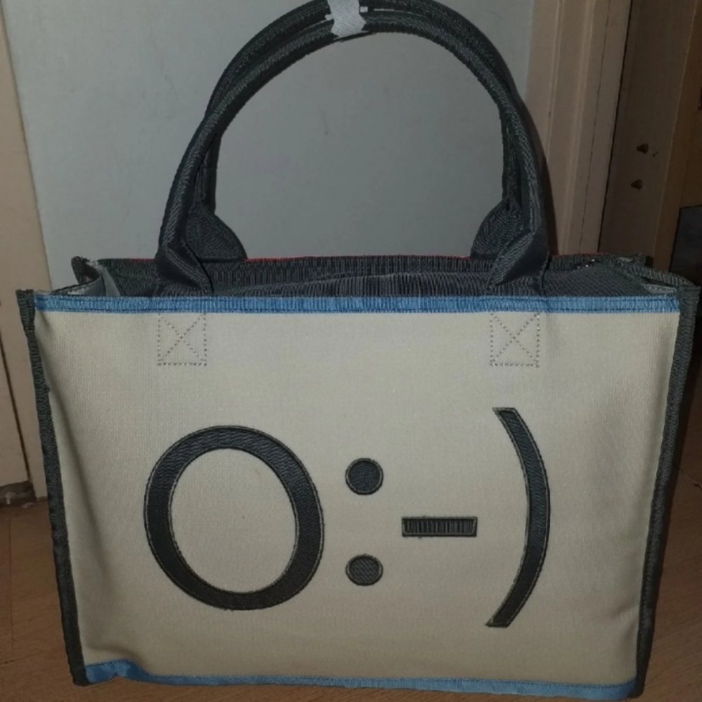 Unplugged laptotes laptop bag Angel/Devil